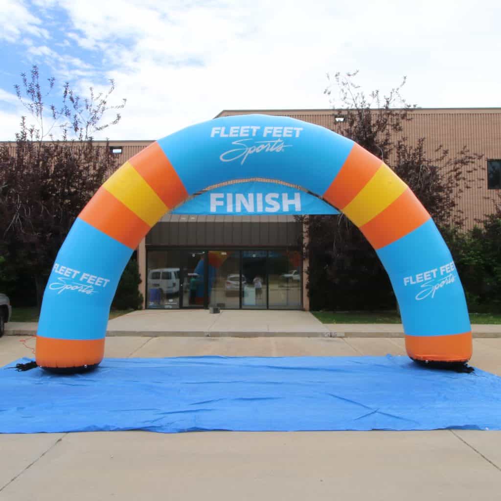 Fleet Feet Sports Light Blue Yellow & Orange Curved Inflatable Race Arch - Boulder Blimp